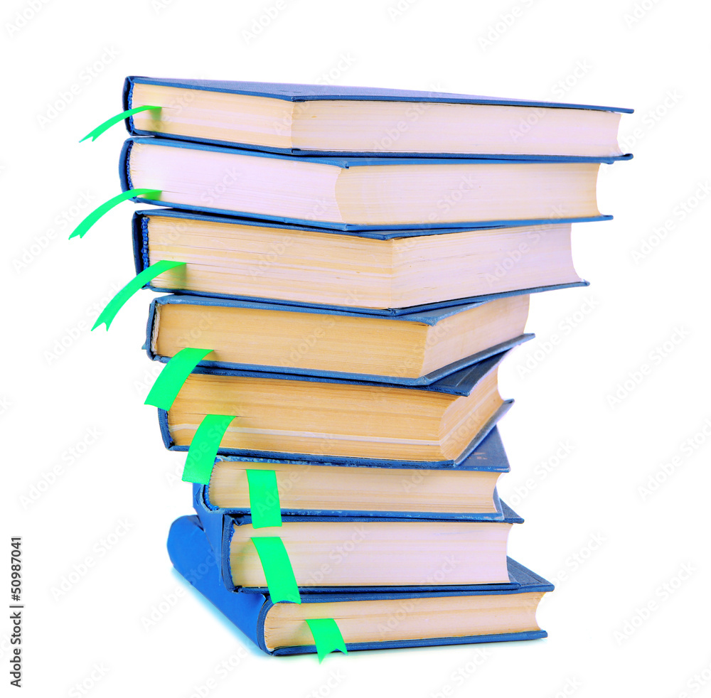 Many books with bookmarks isolated on white Many books with bookmarks isolated on white