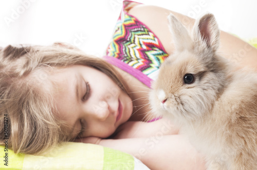 girl sleeps with bunny