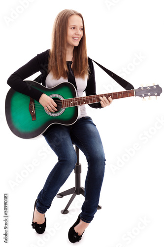 .Beautiful girl with guitar on white background