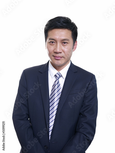 studio portrait of an asian businessman