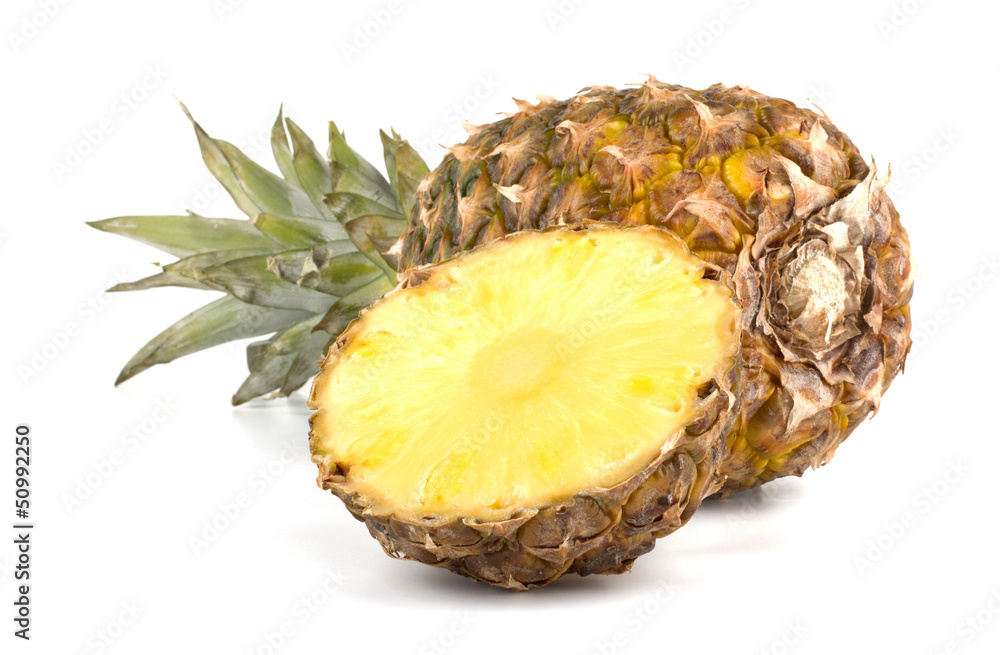 Juicy pineapple with slices isolated on white background Juicy pineapple with slices isolated on white background