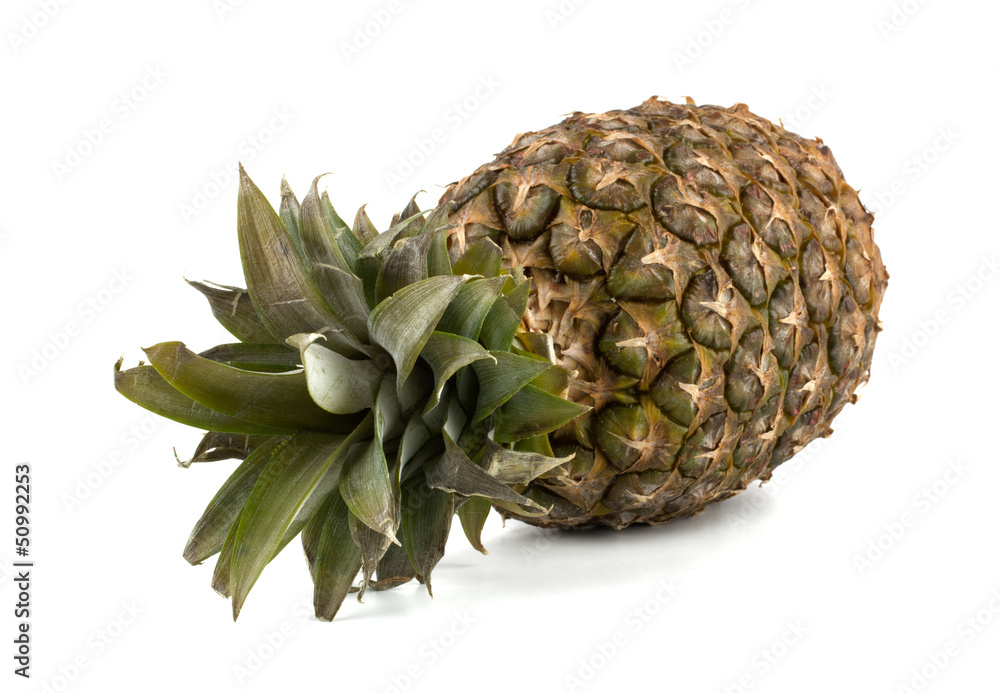Juicy pineapple with slices isolated on white background Juicy pineapple with slices isolated on white background