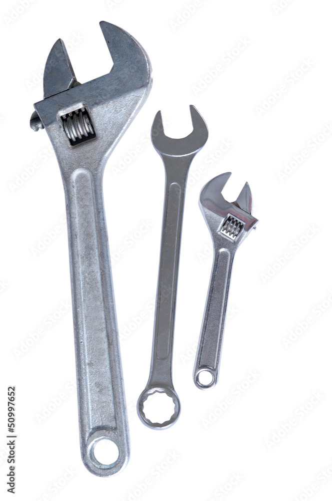 Adjustable wrenches, spanners isolated on white. Adjustable wrenches, spanners isolated on white.