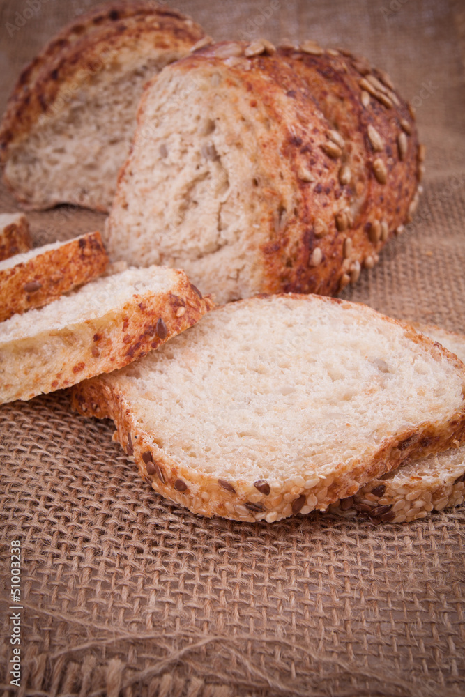 assortment of baked bread on wood table