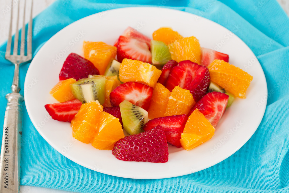 fruit salad on white plate fruit salad on white plate