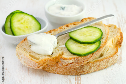 tzatziki with bread on the table