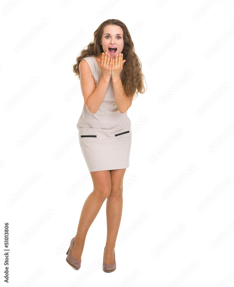 Fototapeta premium Full length portrait of surprised young woman