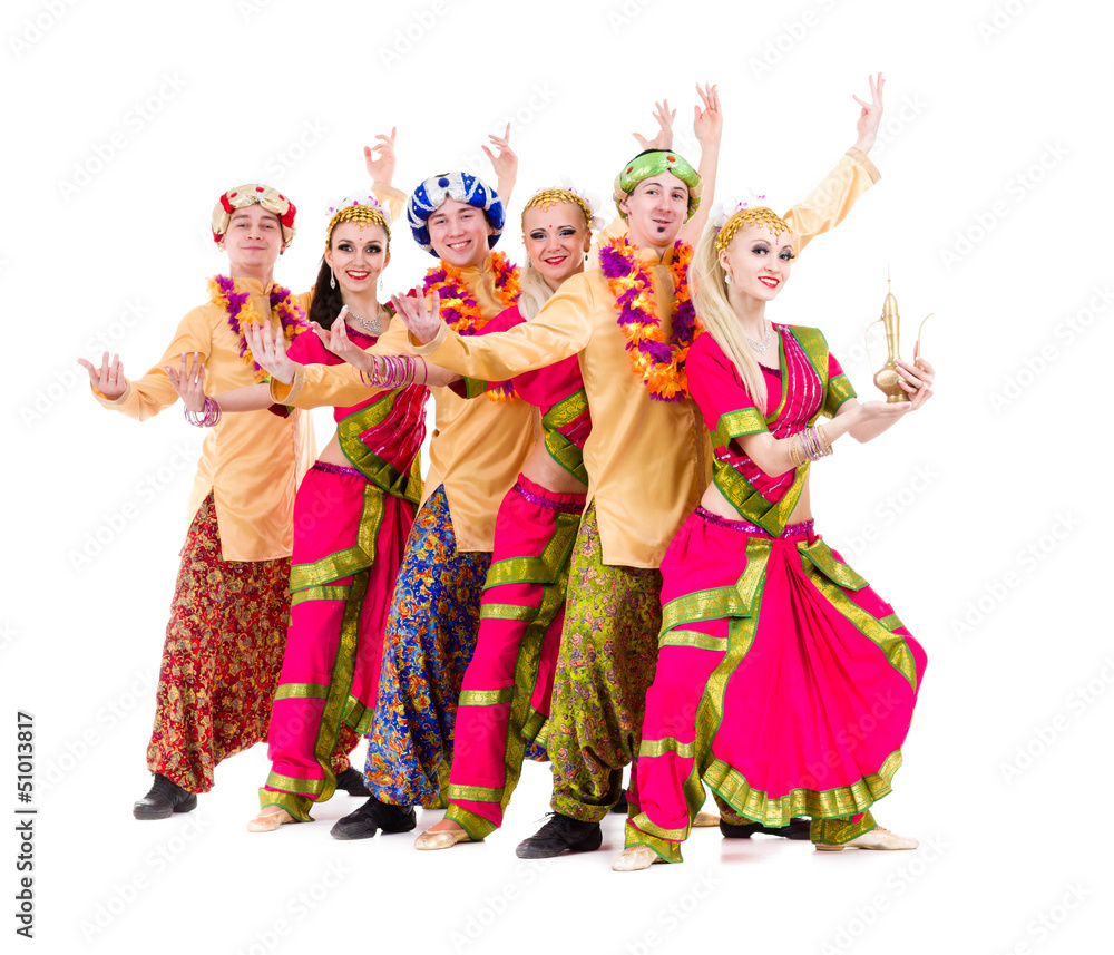 dancers dressed in Indian costumes posing
