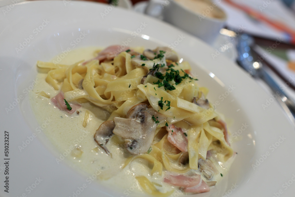 Fettuccine on a white plate Fettuccine on a white plate
