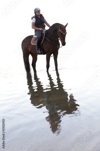 Horse riding in the water