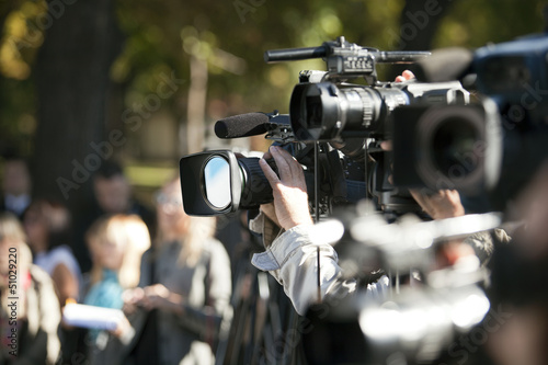 Canvas Print covering an event with a video camera