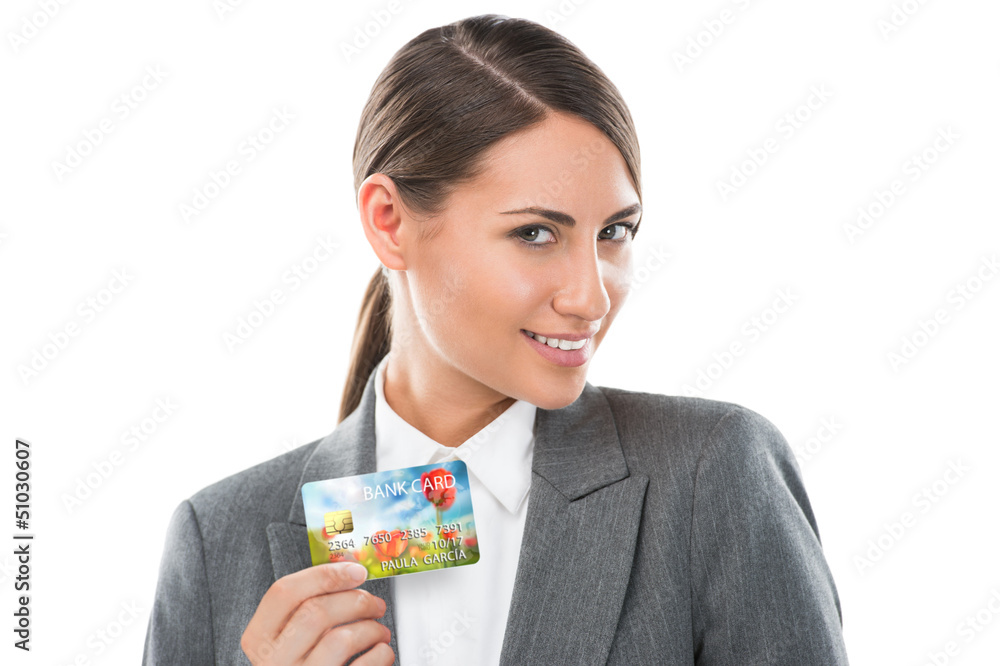 Close-up portrait of young smiling business woman holding credit Close-up portrait of young smiling business woman holding credit