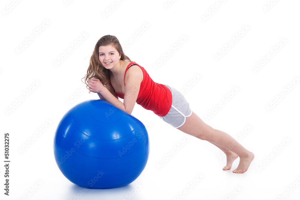 Fototapeta premium Mädchen macht Gymnastik mit Ball Porträt