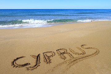 Fotobehang Cyprus Cyprus geschreven in het zand  © viperagp