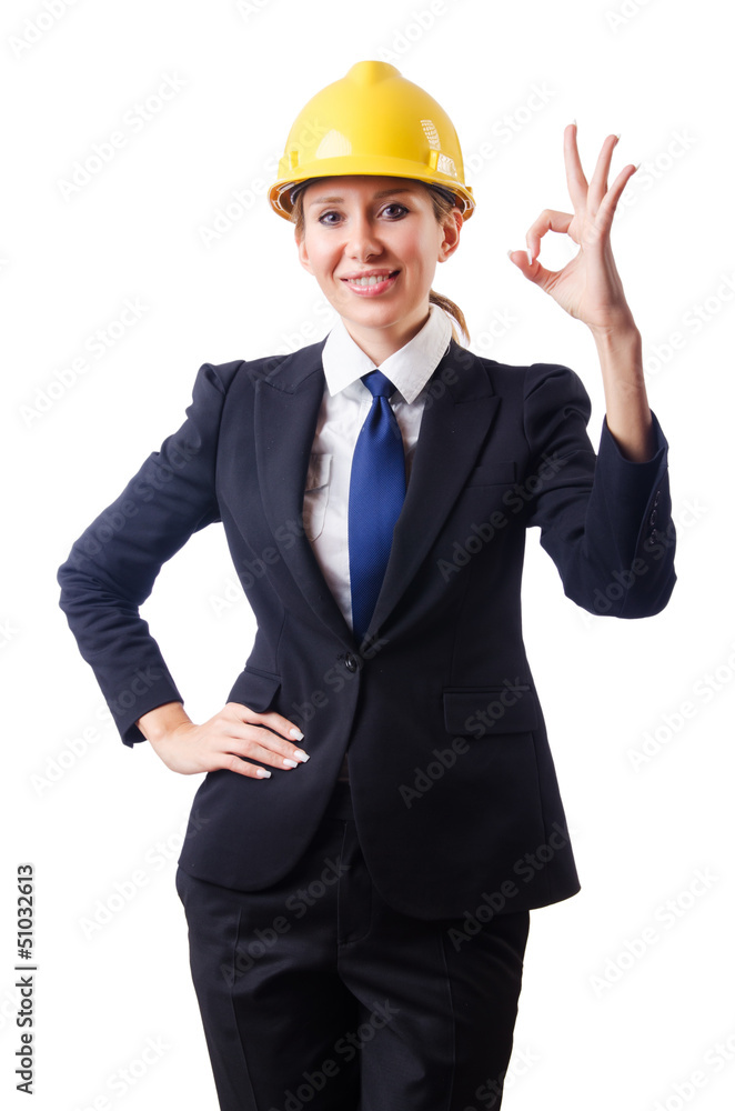 Young businesswoman with hard hat on white Young businesswoman with hard hat on white