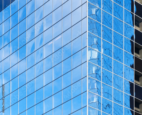 Corner of modern office building with breflections