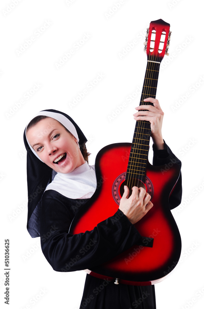 Nun playing guitar isolated on white Nun playing guitar isolated on white