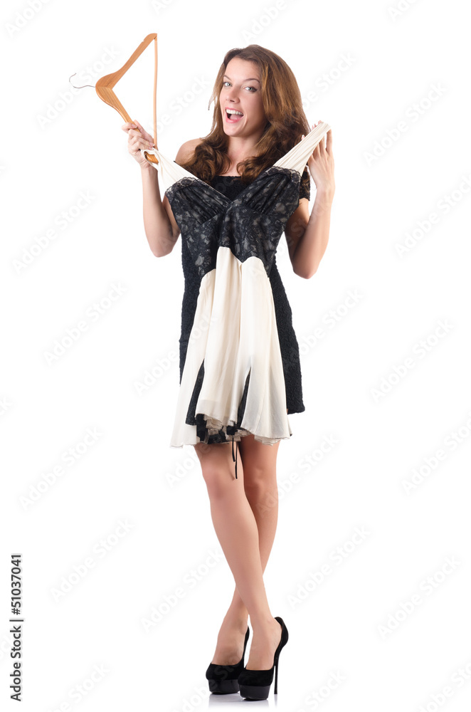 Young woman trying new clothing on white Young woman trying new clothing on white