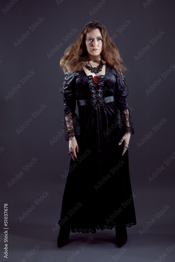 Young women in black long dress Young women in black long dress