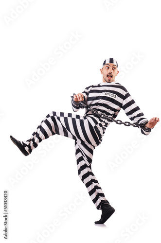 Фотография Convict criminal in striped uniform