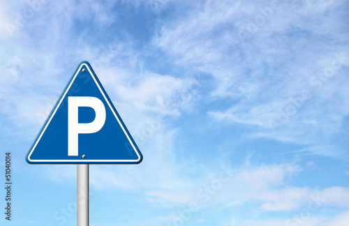 parking sign with blue sky