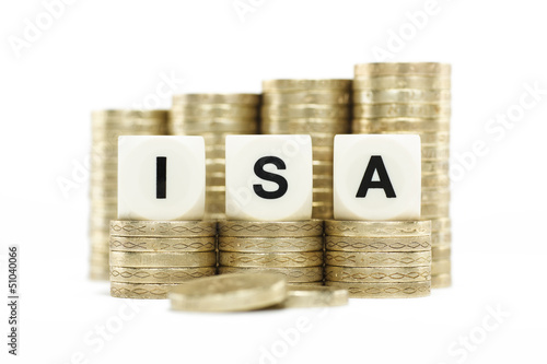 ISA (Individual Savings Account) on gold coins on white backgrou