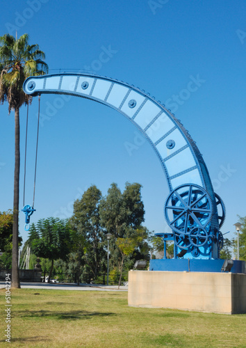 Old blue crane in Seville, Spain