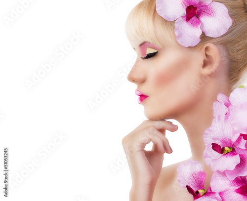Beautiful woman with flowers and pink makeup © dmitri_gromov