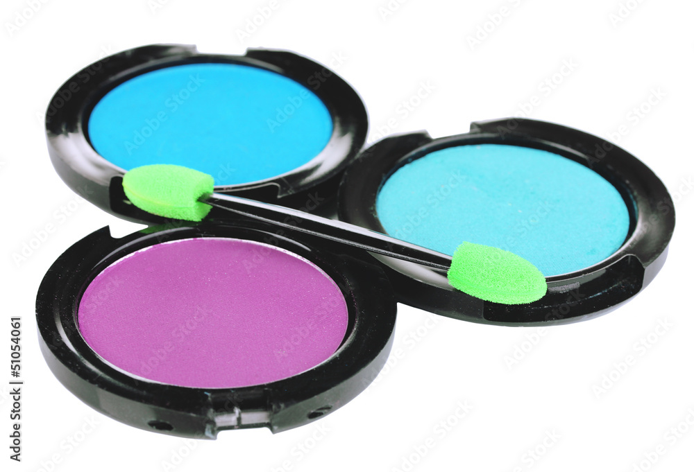 Bright eye shadows and sponge brushes for foundation isolated Bright eye shadows and sponge brushes for foundation isolated