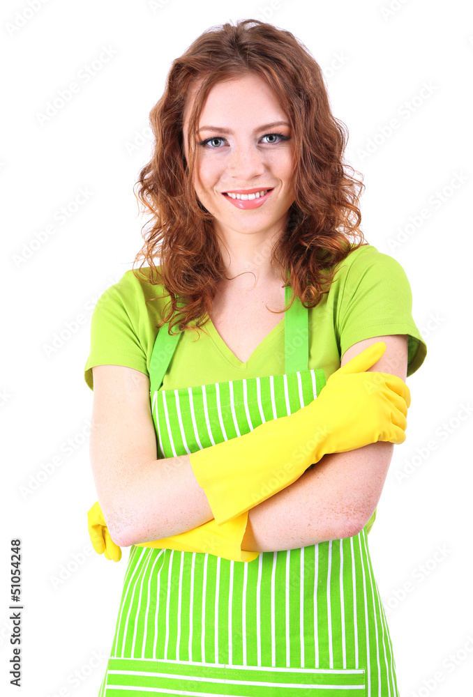 Young woman wearing green apron and rubber gloves, isolated Young woman wearing green apron and rubber gloves, isolated