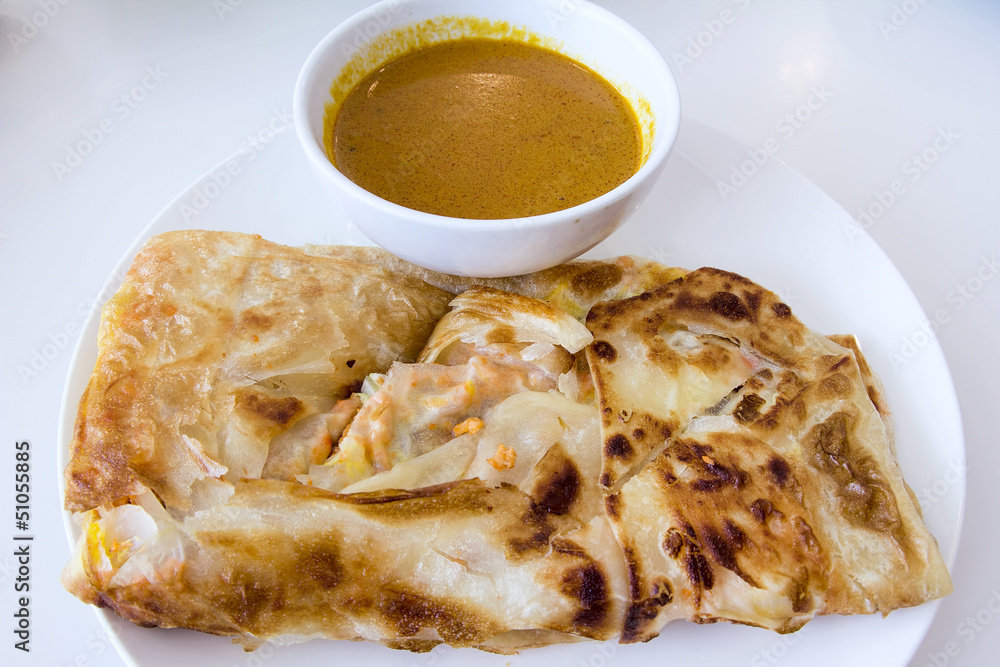 Obraz premium Indian Roti Prata with Curry Sauce