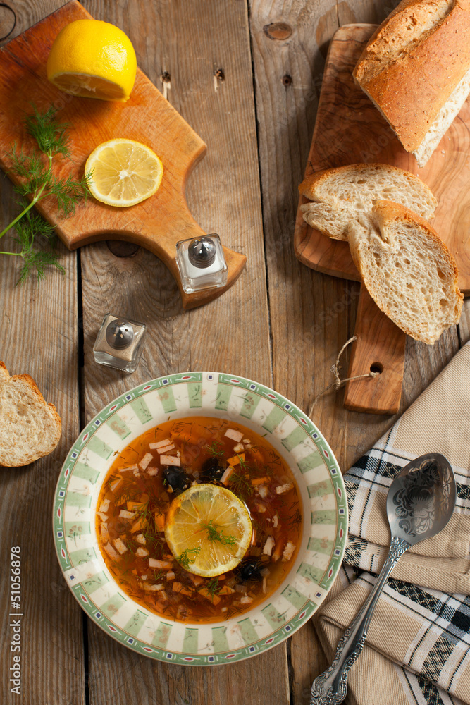 Solyanka, Russian soup with meat, sausage, olives and pickles Solyanka, Russian soup with meat, sausage, olives and pickles