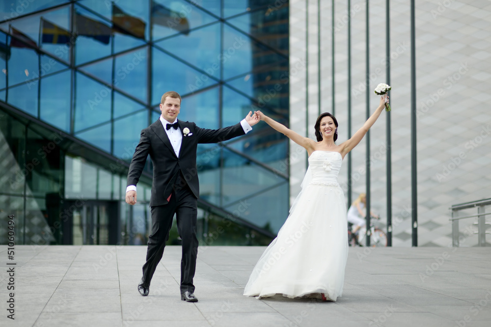 Bride and groom in a city Bride and groom in a city
