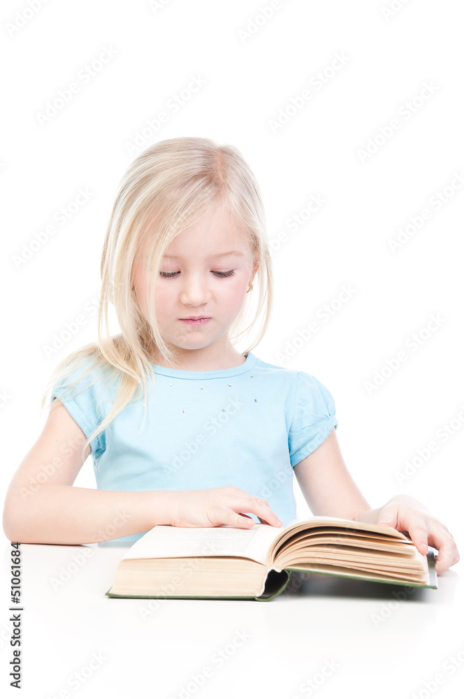 Small and beautiful girl reading a book Small and beautiful girl reading a book