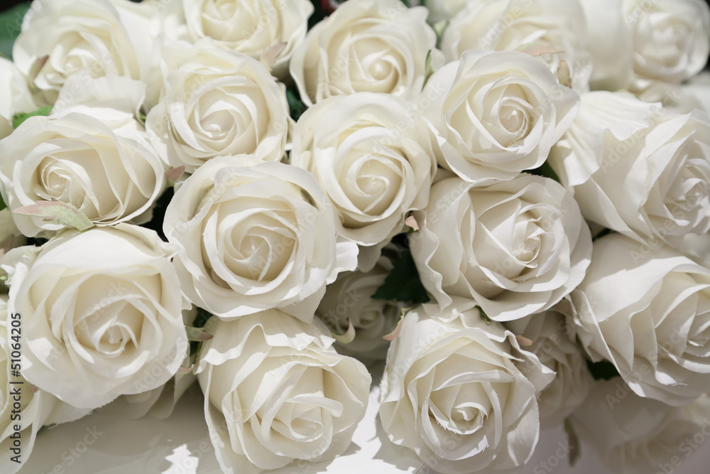 Bunch of artificial white roses with selective focus Bunch of artificial white roses with selective focus