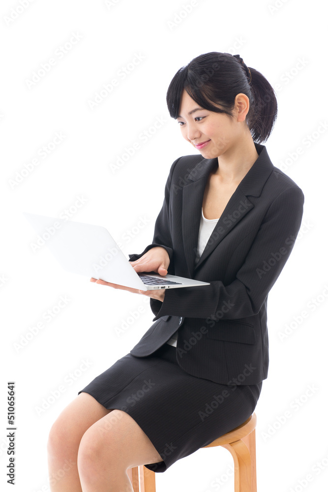 a young asian businesswoman on white background a young asian businesswoman on white background