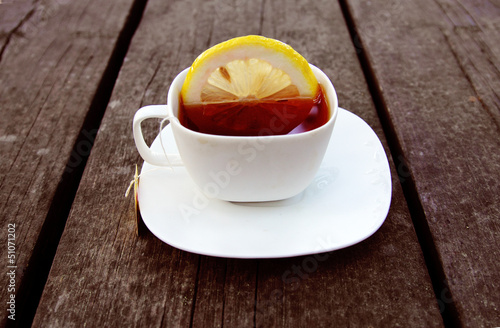 cup of tea on wooden bachground