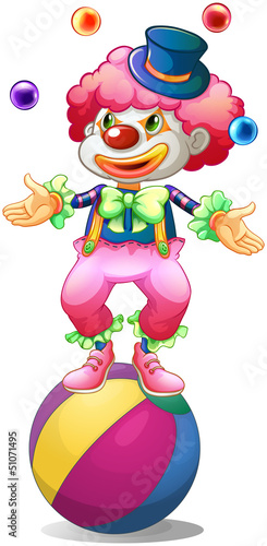 A clown juggling above the ball