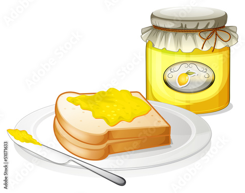 A bottle of jam and a sandwich