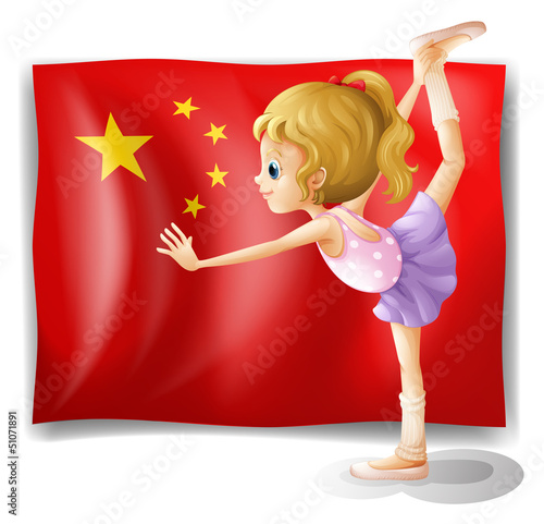 A gymnast in front of the Chinese flag