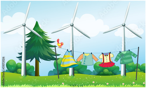 Hanging clothes in front of the windmills