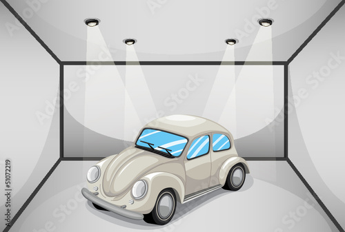 A gray car inside the attached garage