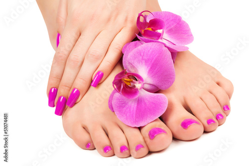 Fotografie, Tablou pink manicure and pedicure with a orchid flower. isolated