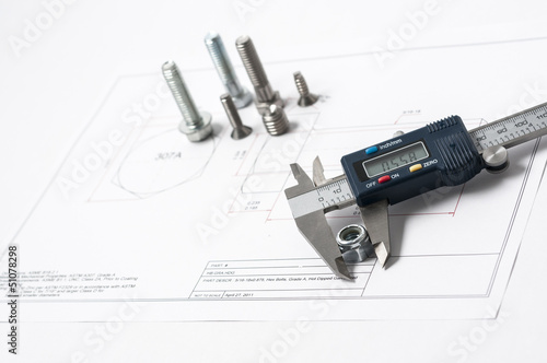 Vernier caliper and assorted screw, nuts and bolts