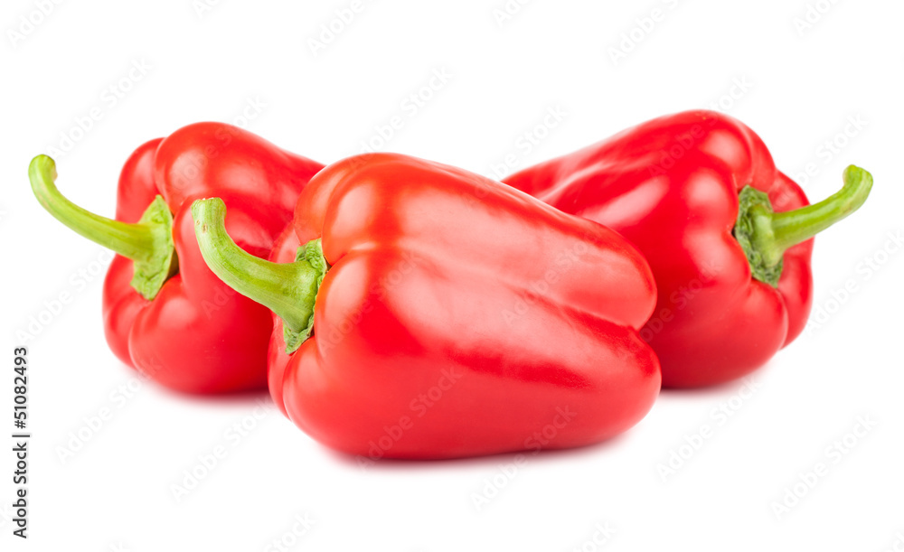Three ripe red peppers