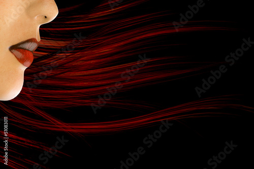 Seitenprofil einer jungen Frau mit roten wehenden Haaren