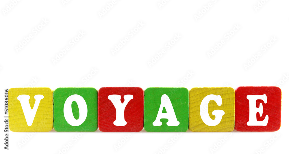 voyage - isolated text in wooden building blocks voyage - isolated text in wooden building blocks
