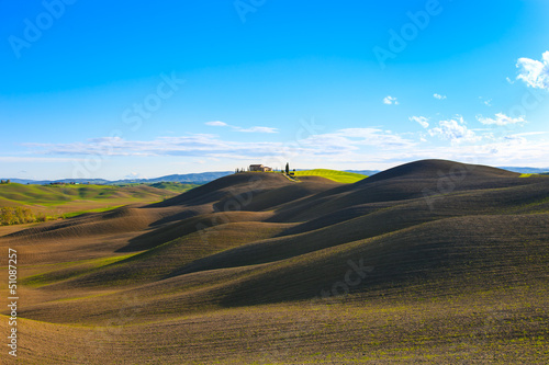 Tuscany, rural landscape. Rolling hills, countryside farm