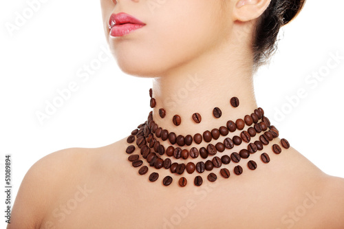 Woman with necklace made frome coffee beans