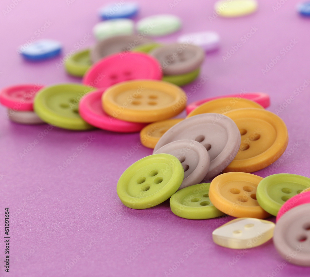 Bright color buttons on a purple background Bright color buttons on a purple background